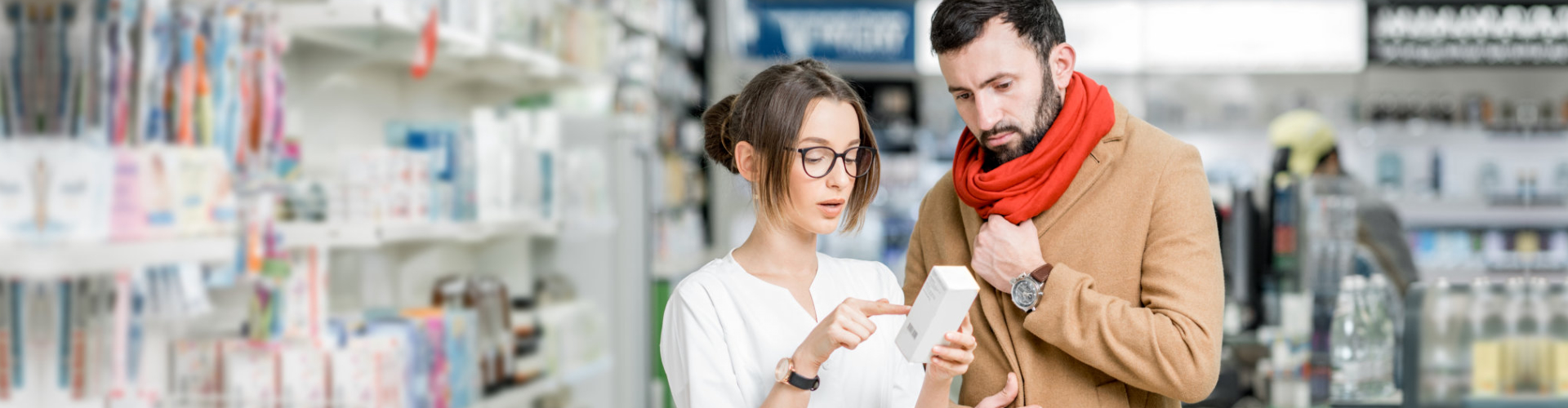 customers in a pharmacy selecting a medicine